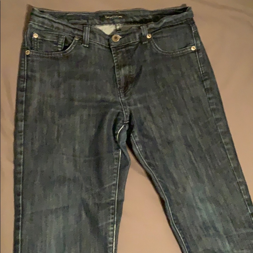Ankle length straight leg jeans. Dark denim